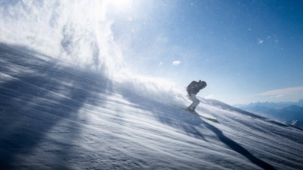 Skier on snowy slope with sunshine. | © Rossignol / DTAUBER