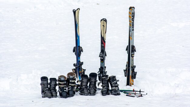 Skis and ski boots in snow