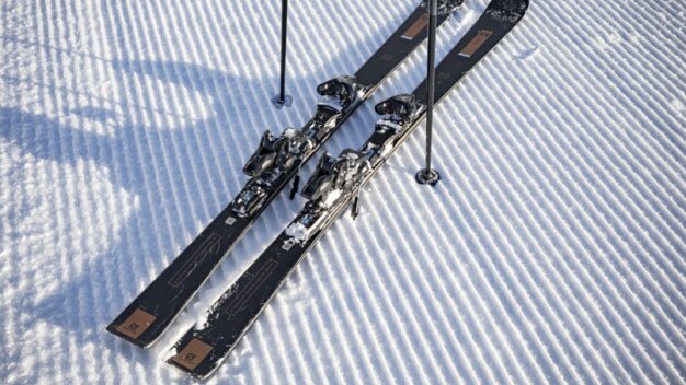 Two skis and poles in the snow