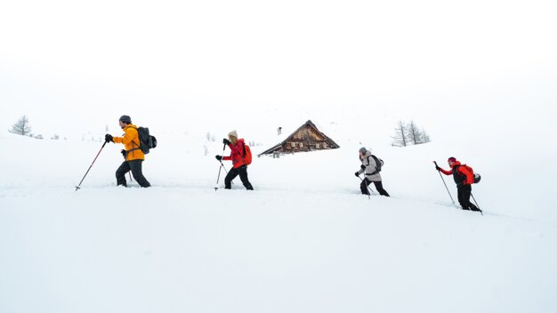 Group of four hikers in snow. | © Atomic Austria GmbH