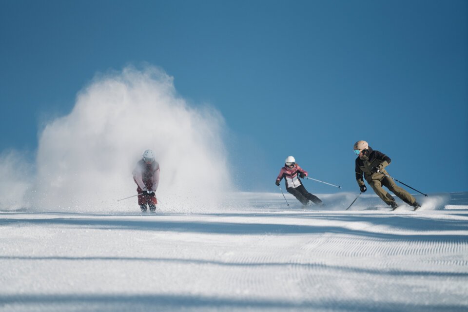 Three skiers on a snowy slope | © INTERSPORT International Corporation GmbH