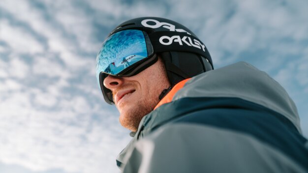 Skier wearing Oakley helmet and goggles