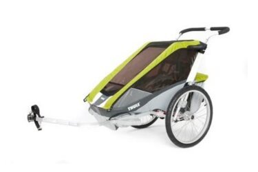 Thule child carrier, green and gray.