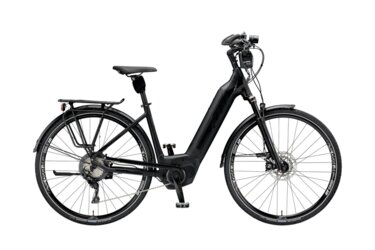 Vélo électrique noir avec porte-bagages.