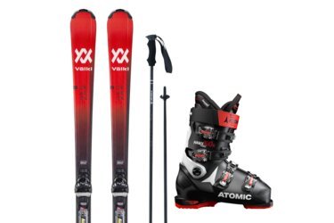 Skis, ski poles, and ski boot.
