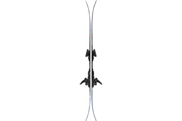 A pair of skis with bindings, against a black background.