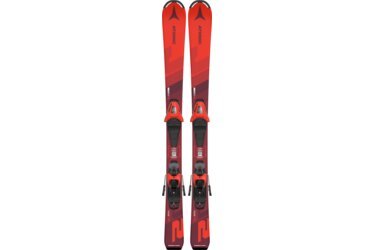 Two red Atomic Redster J2 skis with bindings