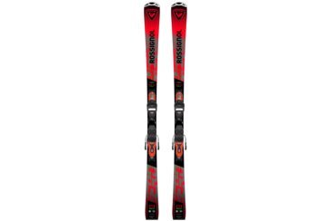 A pair of red and gray Rossignol Hero LTD skis with bindings.