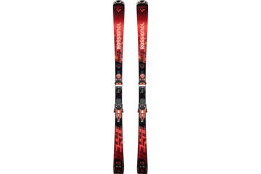 A pair of red Rossignol E15 skis with bindings.