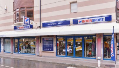 Intersport store with ski equipment and apparel.
