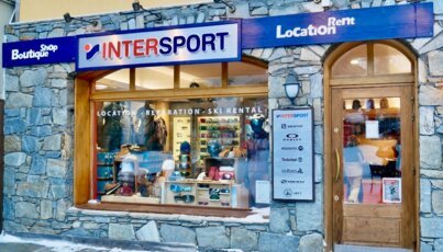 Intersport ski rental shop with storefront and door