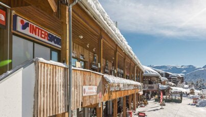 Winter village center with shops