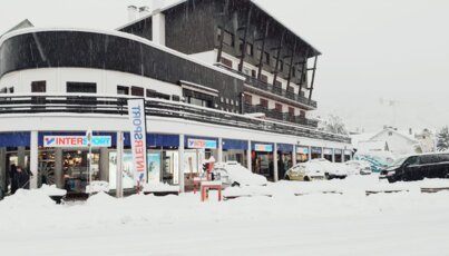 Intersport store in a snowy landscape