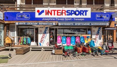 Intersport store facade with ski equipment