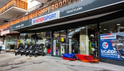 Intersport store with sleds and strollers in front