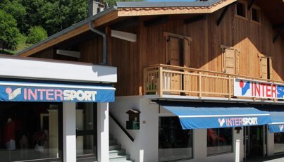 Intersport store in a wooden building.