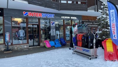 Intersport store with ski and sports equipment in winter.