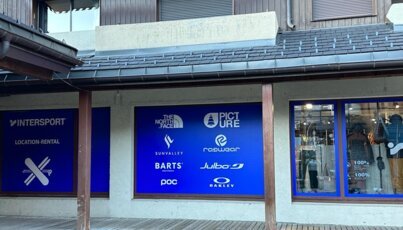Intersport store with brand logos in the window