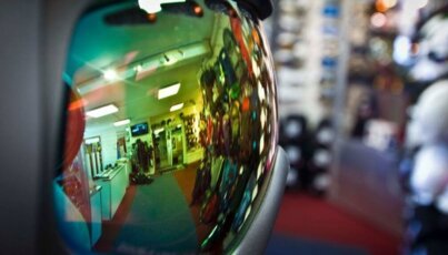 Reflection of a store in ski goggles