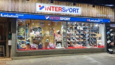 Intersport store window display of ski gear and clothing