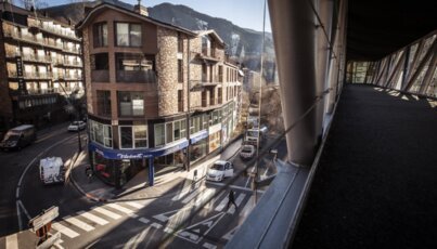 Street scene in a town with buildings and a pedestrian crossing