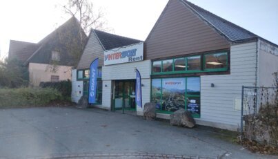 Intersport Rent store with Giant flags