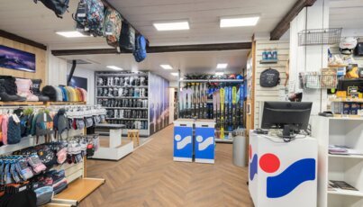 Interior view of a sports shop for skiing and winter equipment.