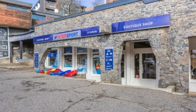 Intersport shop with sleds in front