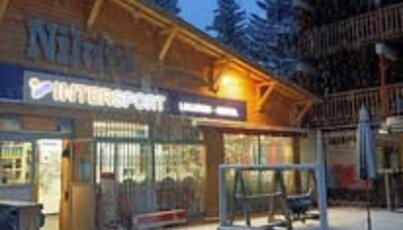 Intersport store in a snowy ski resort.
